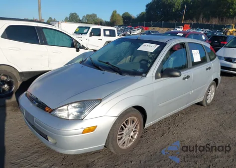 2003 Ford Focus Zx5 z USA, uszkodzony, nr VIN 3FAFP37343R186112